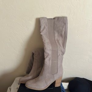 Brand new. Mid calf boots. Color tan. Size 9 1/2